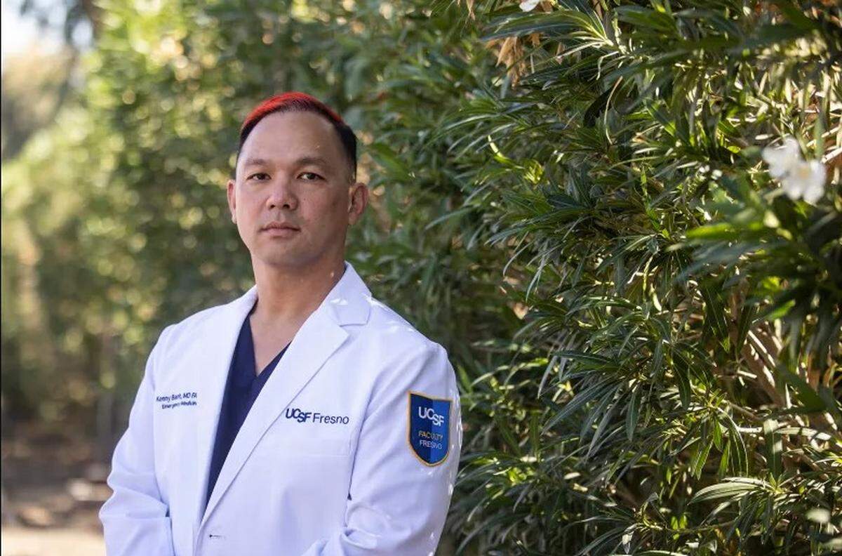 Dr. Kenny Banh, director of the mobile health unit for UCSF-Fresno, at a health fair at Harris Ranch in Coalinga on Oct. 18, 2025. Photo by Larry Valenzuela, CalMatters/CatchLight Local