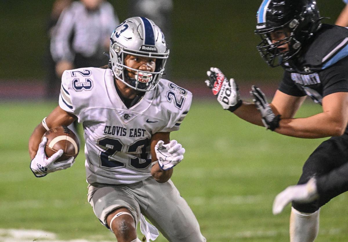 Clovis East’s Lindsey Graves tries to find room up the sideline on a run against Clovis North in their Central Section Division I semifinal at Veterans Memorial Stadium on Friday, Nov. 17, 2023.