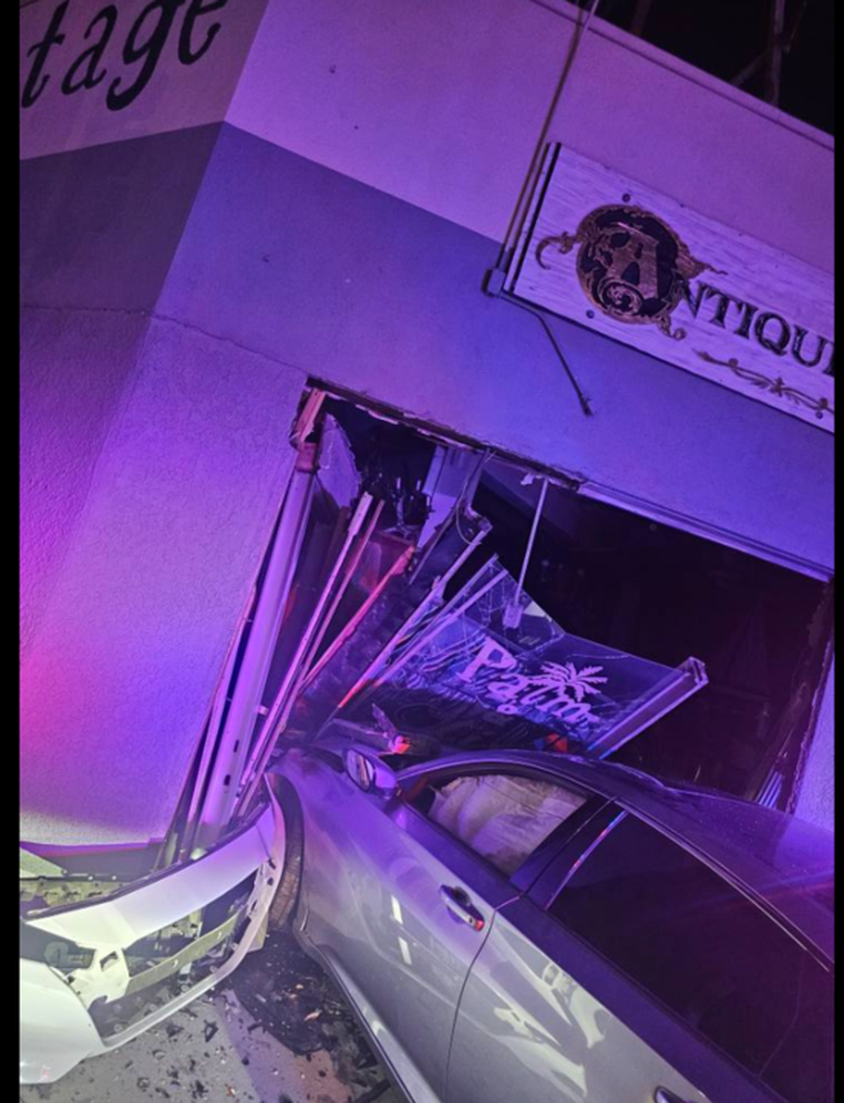 A driver hit another car while fleeing from police on Sept. 11, causing both vehicles to crash into Palm Olive Antiques in Fresno’s Tower District, leaving major damage.