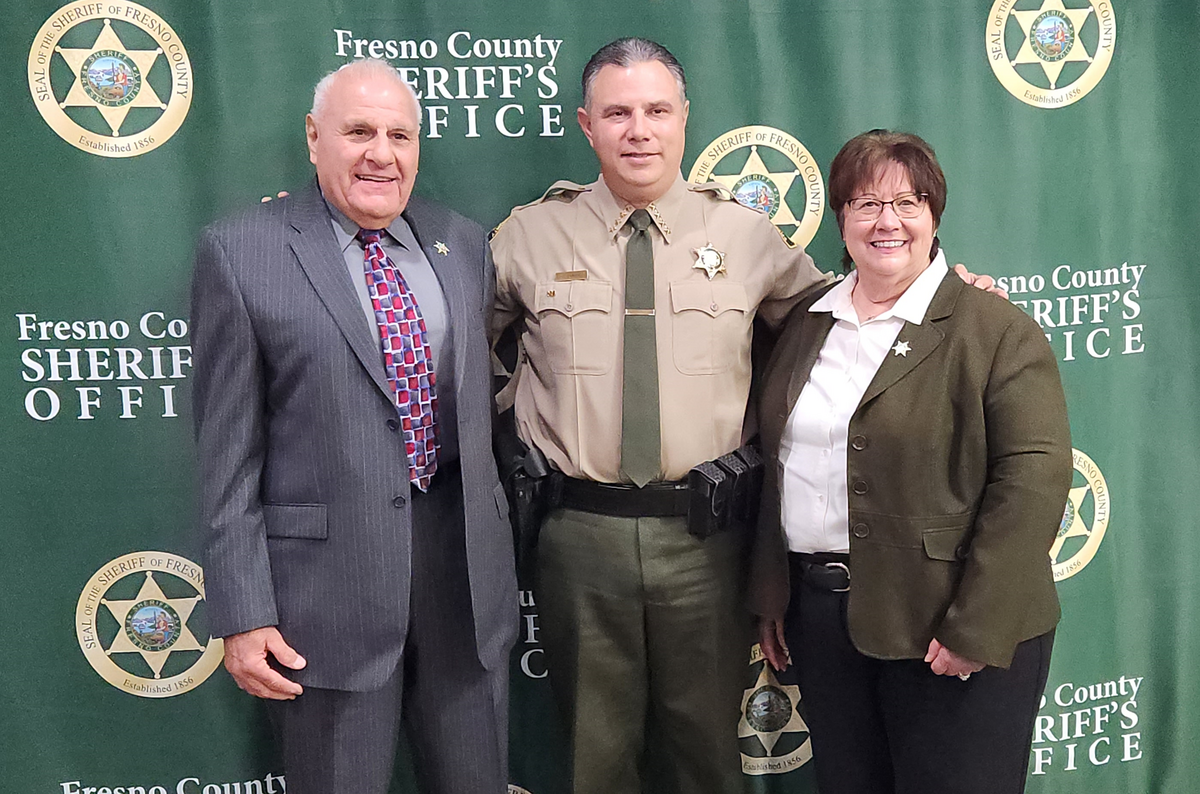 Three generations of Fresno County sheriffs, fom left to right, the late Steve Magarian, current sheriff John Zanoni and Margaret Mims.