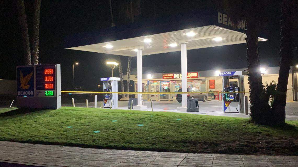 Fresno Police comb the Beacon gas station for evidence after a man was shot in the head, west of highway 99 on Thursday, Sept. 17, 2020.