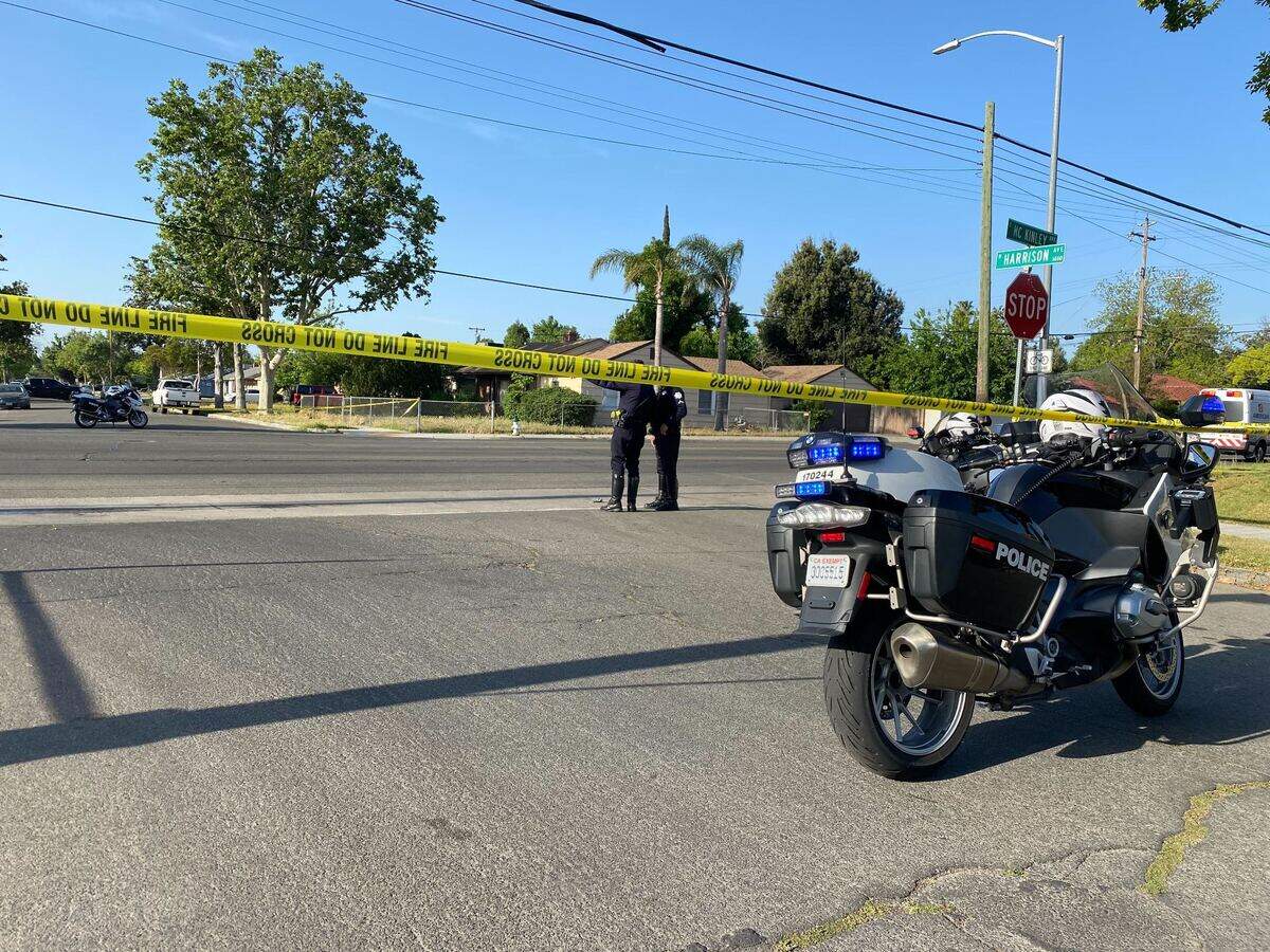 Fresno police on the scene of a fatal crash that killed a pedestrian near McKinley and Harrison avenues in Central Fresno Wednesday, April 27, 2022.