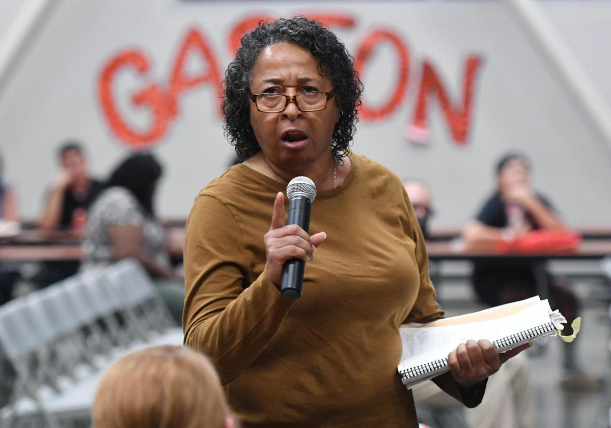 Brunette Harris, a long time resident of west Fresno, voices her opposition to Fresno City College’s new West Fresno Center campus opening in west Fresno during a meeting held at Gaston Middle School Thursday night, Oct. 20, 2022 in Fresno.