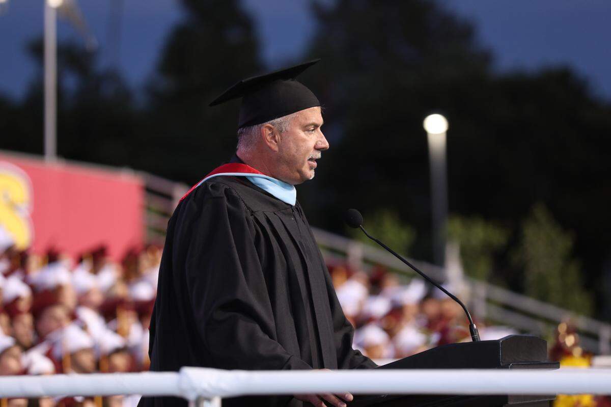 Eric Swain, then principal of Clovis West High School, speaks at the Class of 2023’s graduation ceremony at Veteran’s Memorial Stadium on May 30, 2023. Swain allegedly missed the Class of 2024’s graduation on June 5, 2024. The school district confirmed Swain “requested” to step down from his role as principal - but remains a district employee - and announced it to school staff the day after graduation, on Thursday, June 6.