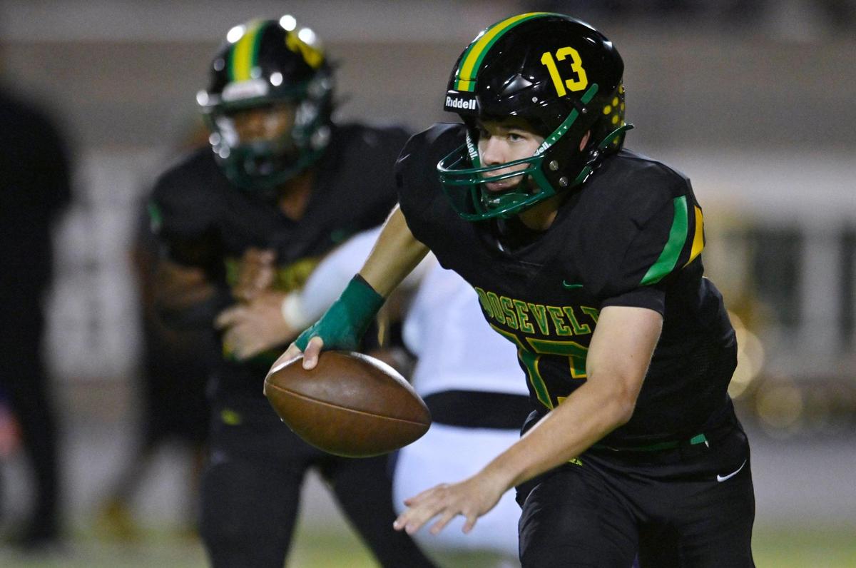 Roosevelt quarterback Jackson Kloster scrambles for a pass against Mission Oak Friday, Sept. 1, 2023 in Fresno. Mission Oak won, 31-7.