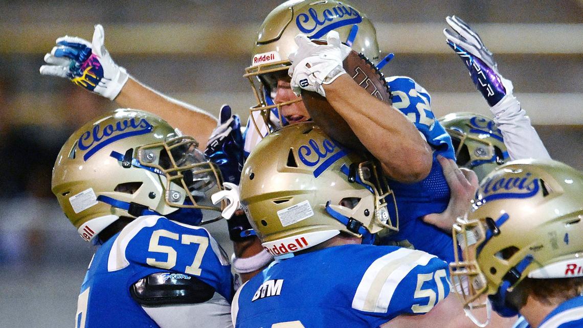 Clovis High’s Maddox Merrill, top, is lifted in celebration after he scored a touchdown against Bullard making it 25-0 in the second quarter Friday night, Sept. 20, 2024 at Lamonica Stadium in Clovis.