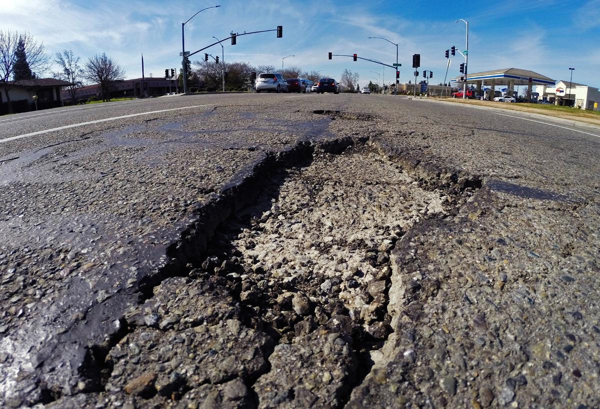 Nees Avenue, east of First St. shows need for repair Thursday, Feb. 7, 2019 in Fresno.