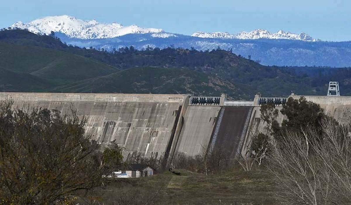 Water flows from Friant Dam as the Bureau of Reclamation increased water releases Friday, Jan. 6, 2023 near Friant.