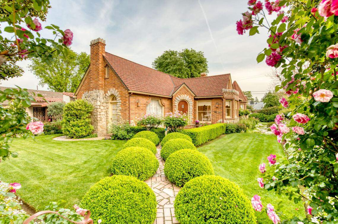 Lush gardens can be found at this storybook Tudor cottage, 304 East Simpson Ave. in Fresno. It’s on the market for $455,000.
