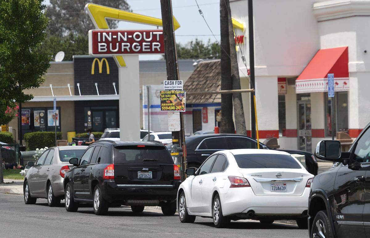 Cars at a standstill during lunch hour outside an In-N-Out in California.