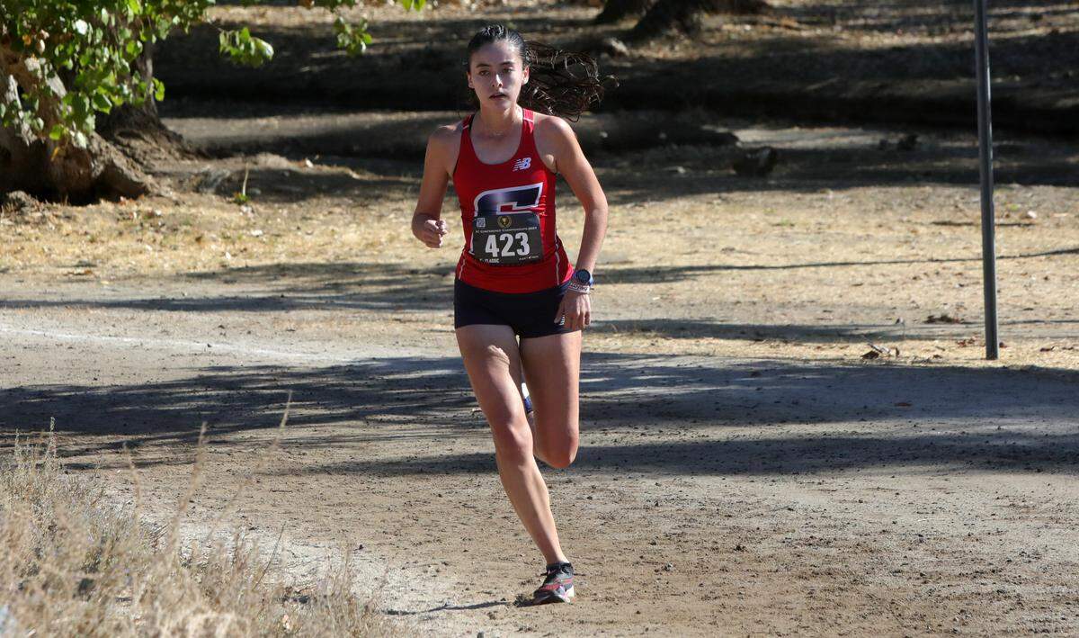Sanger High junior Alexa Vega finished second (19:15.1) at the CMAC cross country championships at Woodward Park on Nov. 8, 2023.