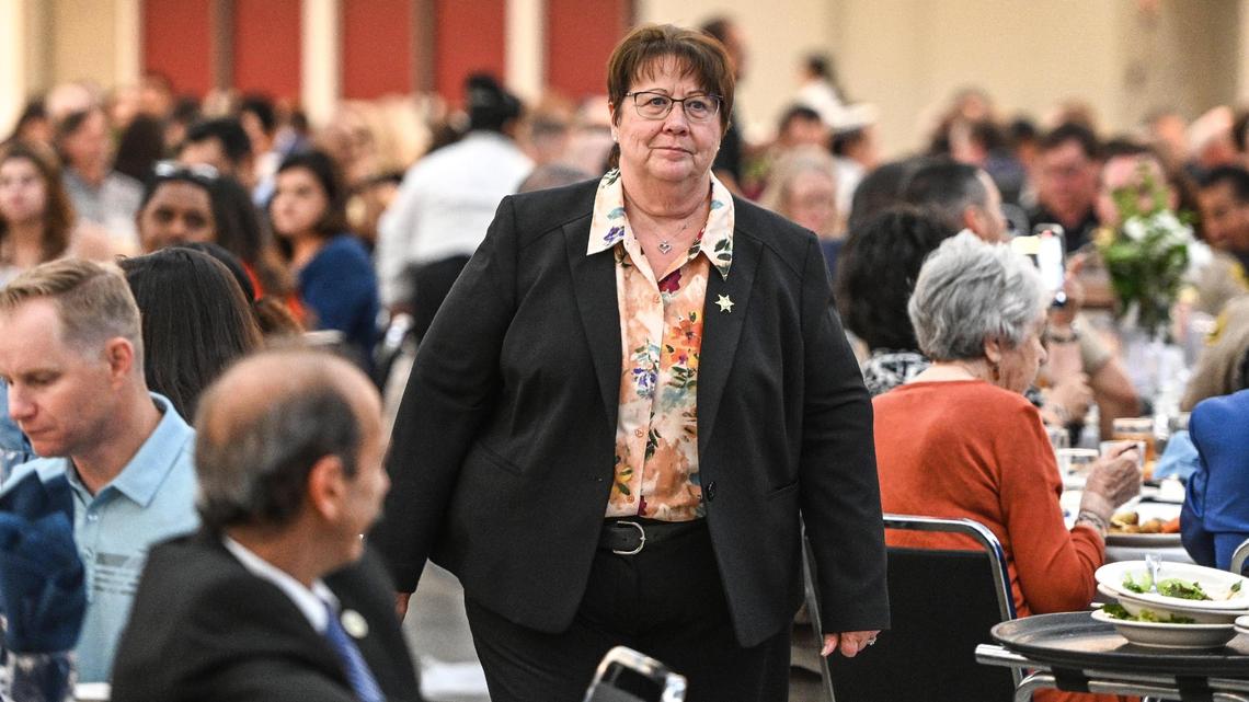 Fresno County Sheriff Margaret Mims walks to the stage after being announced as the recipient of Fresno County’s Lifetime of Service Award by Supervisor Brian Pacheco during the annual State of the County luncheon at the Fresno Convention Center’s Valdez Hall on Tuesday, September 27, 2022.