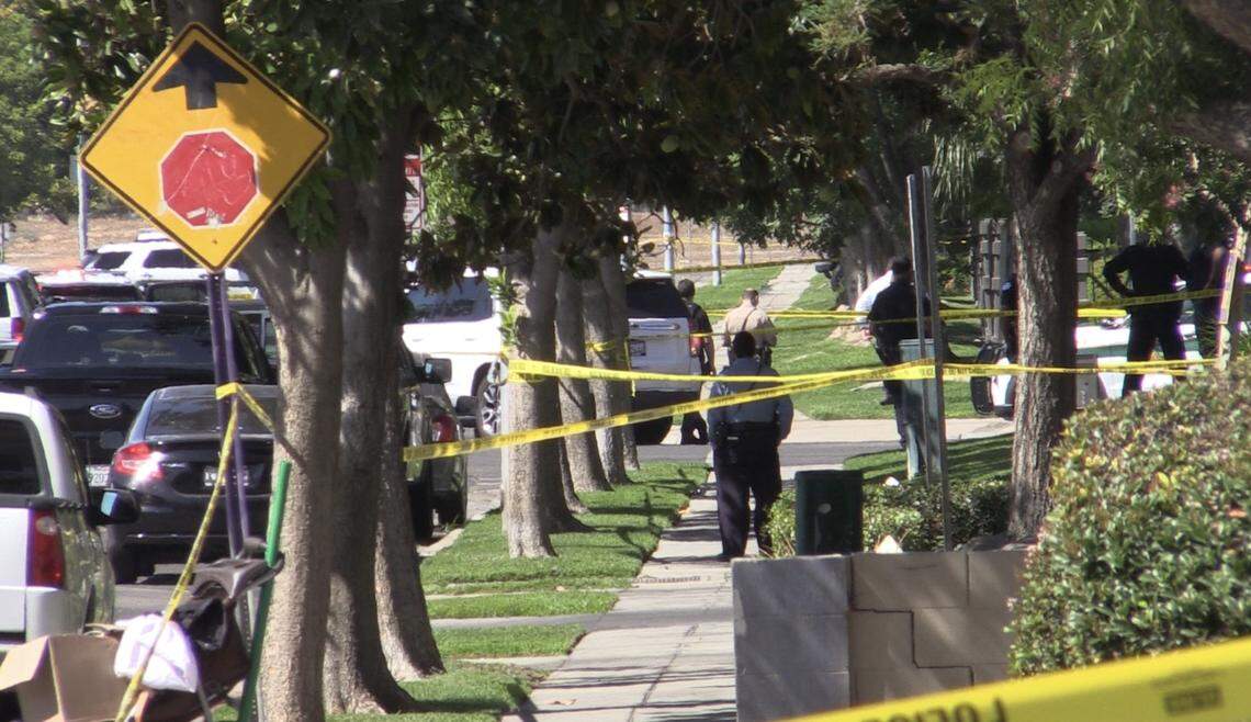 Authorities investigate a deputy involved shooting after a suspect opened fire at deputies at Valentine and San Jose avenues in Fresno, California on Thursday, Aug. 11, 2022.