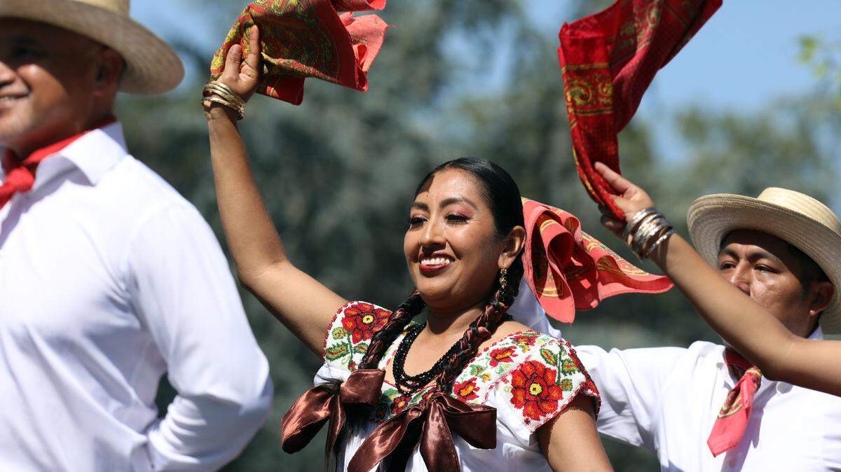 Ballet Folklórico Nueva Antequera dancers perform Sones y Chilenas de San Juan Cacahuatepec from the costal region of Oaxaca, México during the Guelaguetza Fresno held Sept. 28, 2025 at Fresno City College.