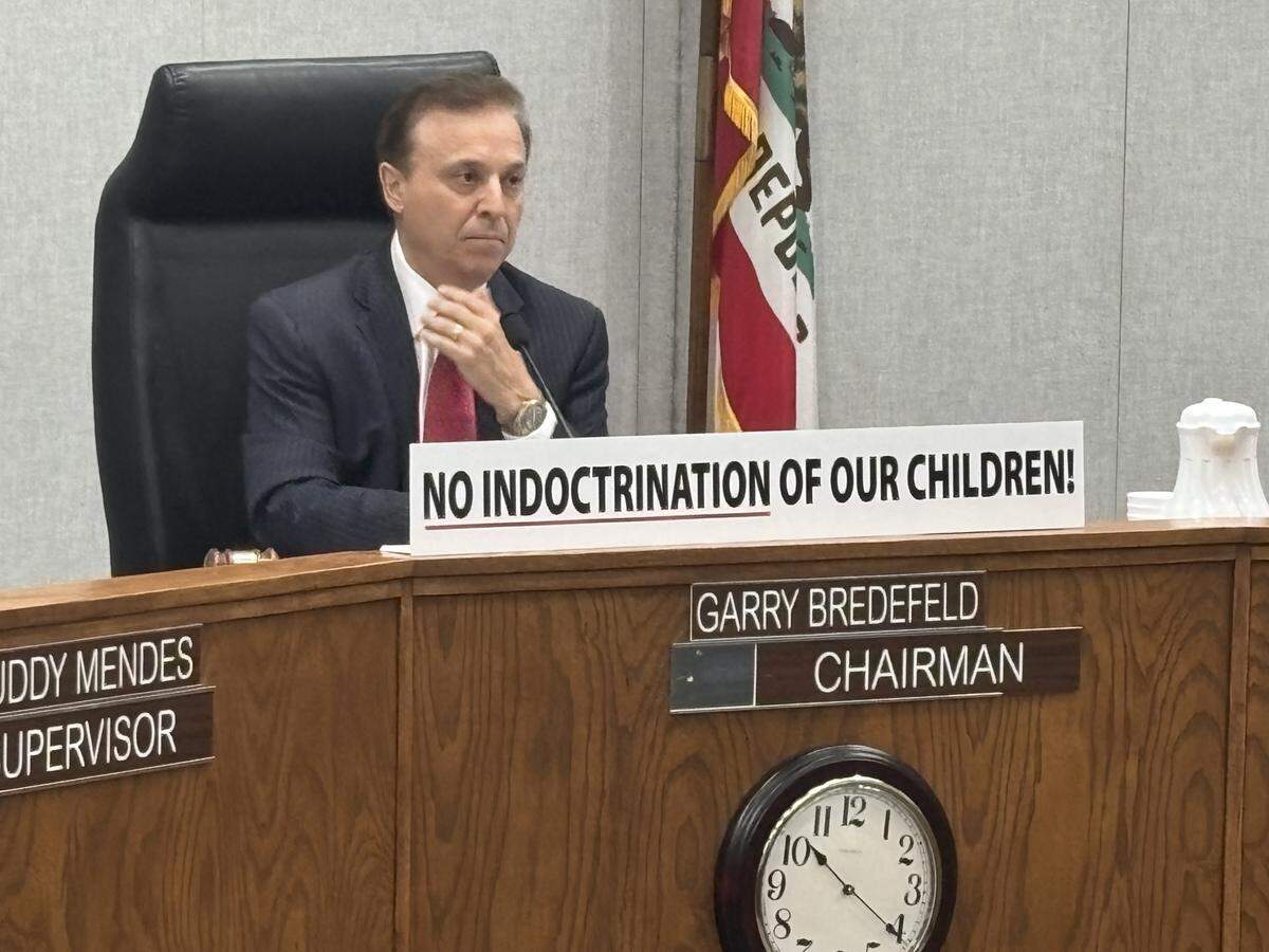 Fresno County Supervisor Garry Bredefeld put a sign on the dais on Tuesday, May 12, 2026, before he voted against allowing the library to participate in Pride Month, and restricting some displays by the library.