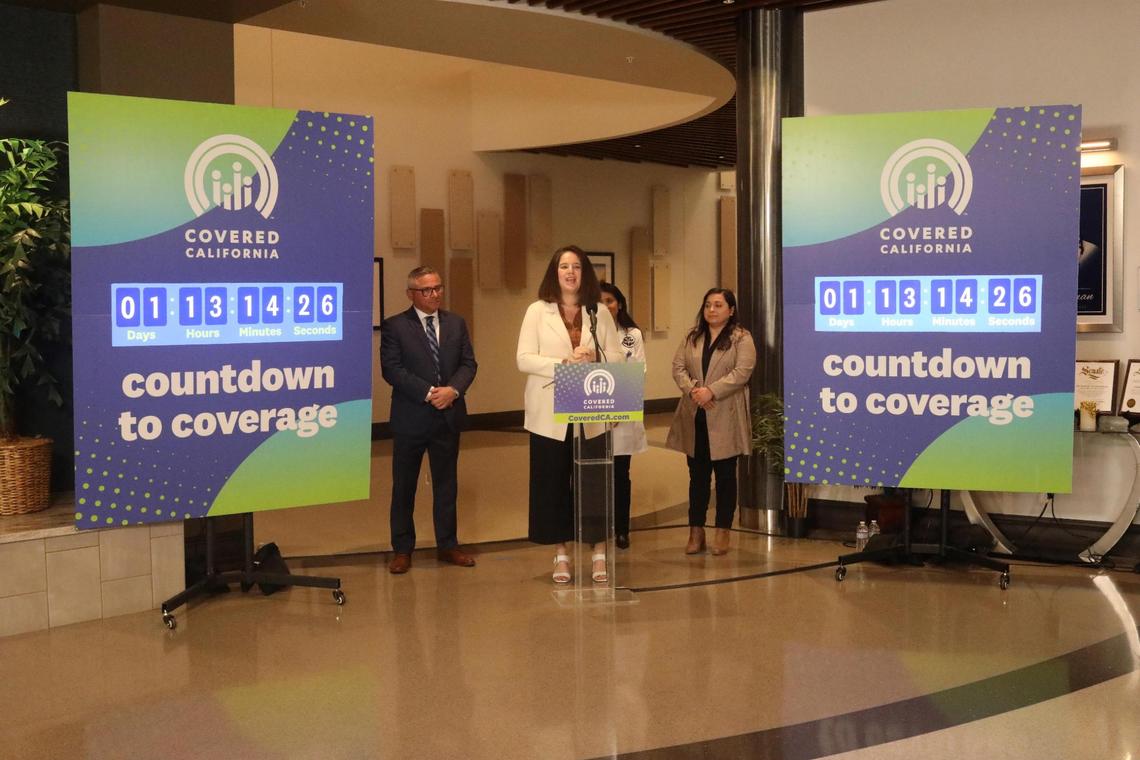 Covered California Executive Director Jessica Altman (center) during a January press conference in Fresno.