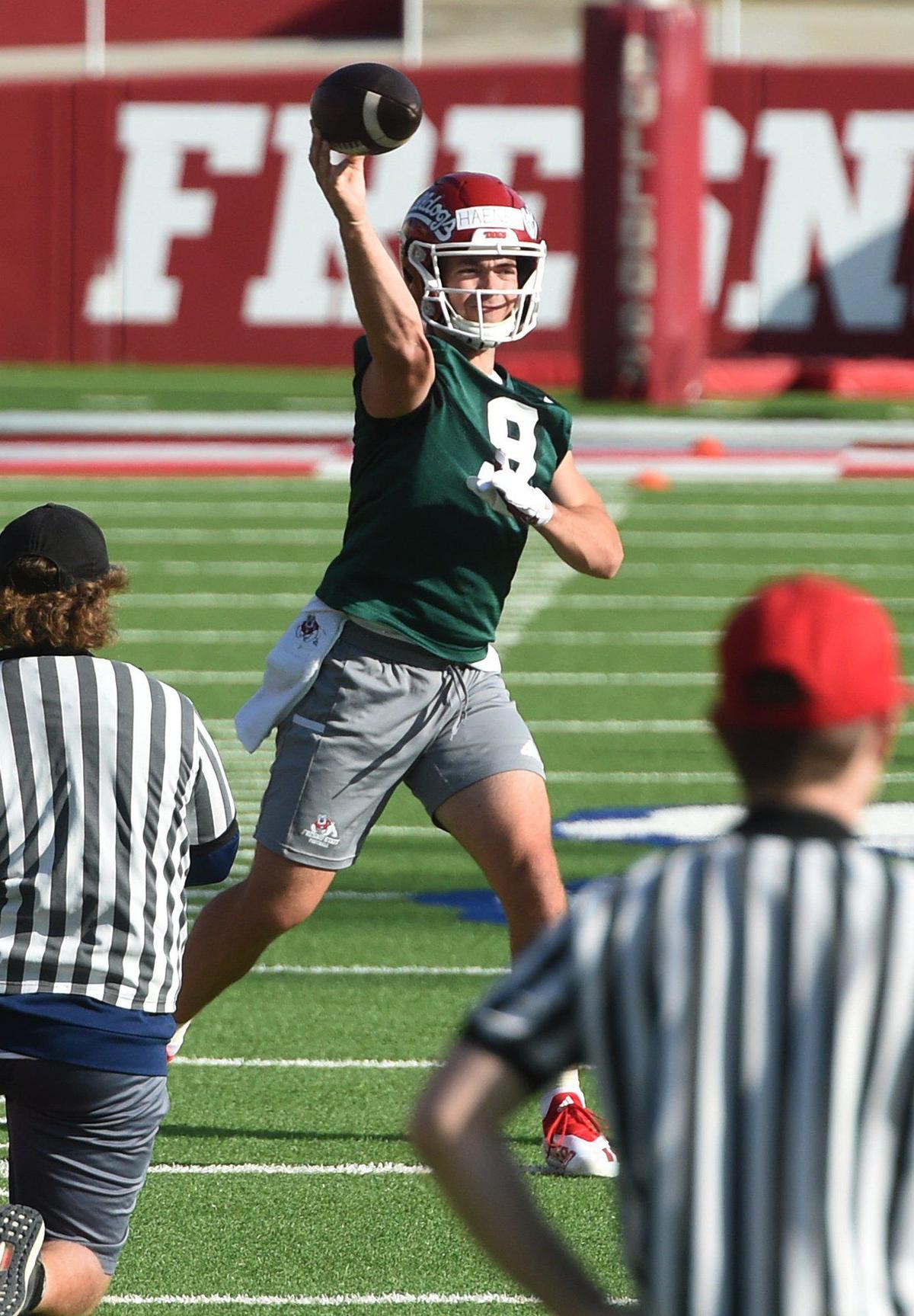 Fresno State quarterback Jake Haener fires a pass on the first day of spring practice, Monday March 21, 2022.