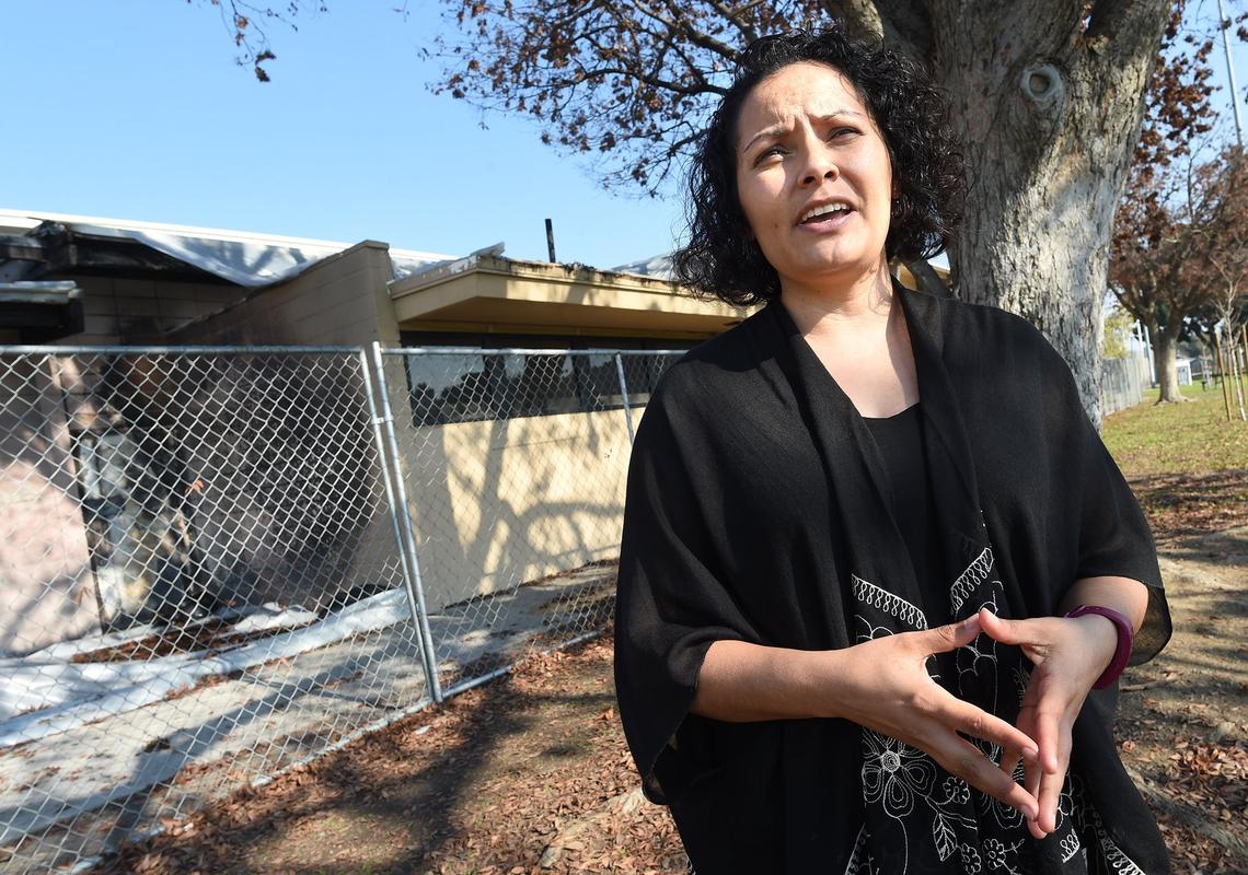 Next to the burned Romain Playground Community Center, Sandra Celedon, president and CEO of Fresno Building Healthy Communities, talks about Measure P, the parks initiative that failed in November. She said the fire happened on New Years of this year.