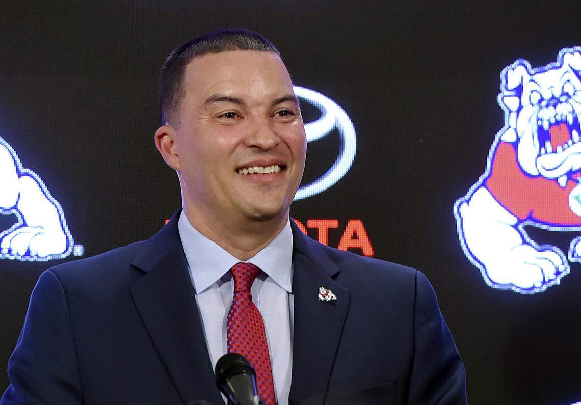 Fresno State coach Justin Hutson is all smiles following his victorious debut: a 91-63 victory over Alaska-Anchorage at the Save Mart Center on Tuesday, Nov. 6, 2018.