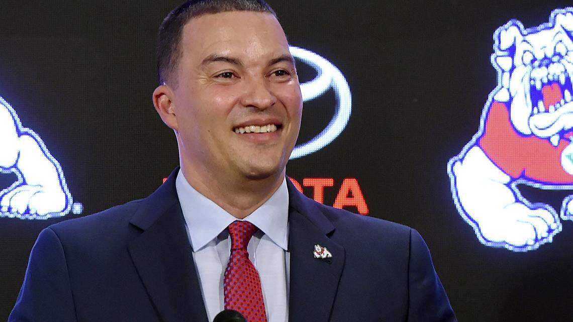 Fresno State coach Justin Hutson is all smiles following his victorious debut: a 91-63 victory over Alaska-Anchorage at the Save Mart Center on Tuesday, Nov. 6, 2018.