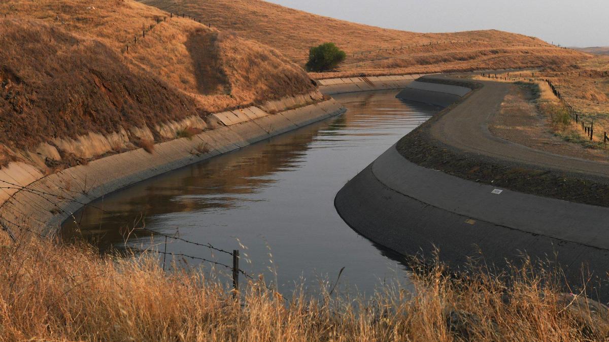 The Friant-Kern Canal flows south from Friant Dam Monday, Sept. 28, 2020 northeast of Fresno.