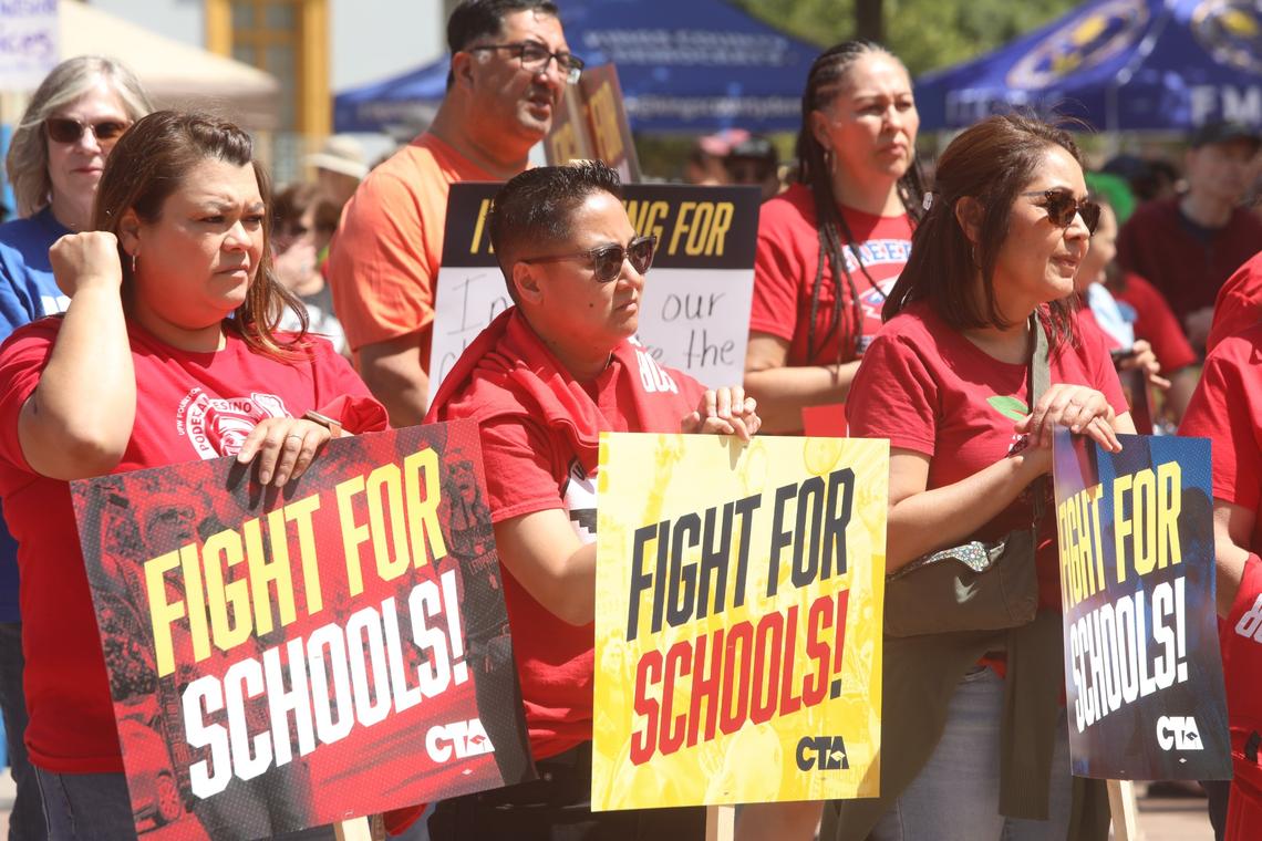 Central Valley educators, families, students and supporters demand U.S. Rep. David Valadao to defend funding for valley schools and urge the Republican congressman to oppose federal cuts to public education on May 17 in Hanford CA.