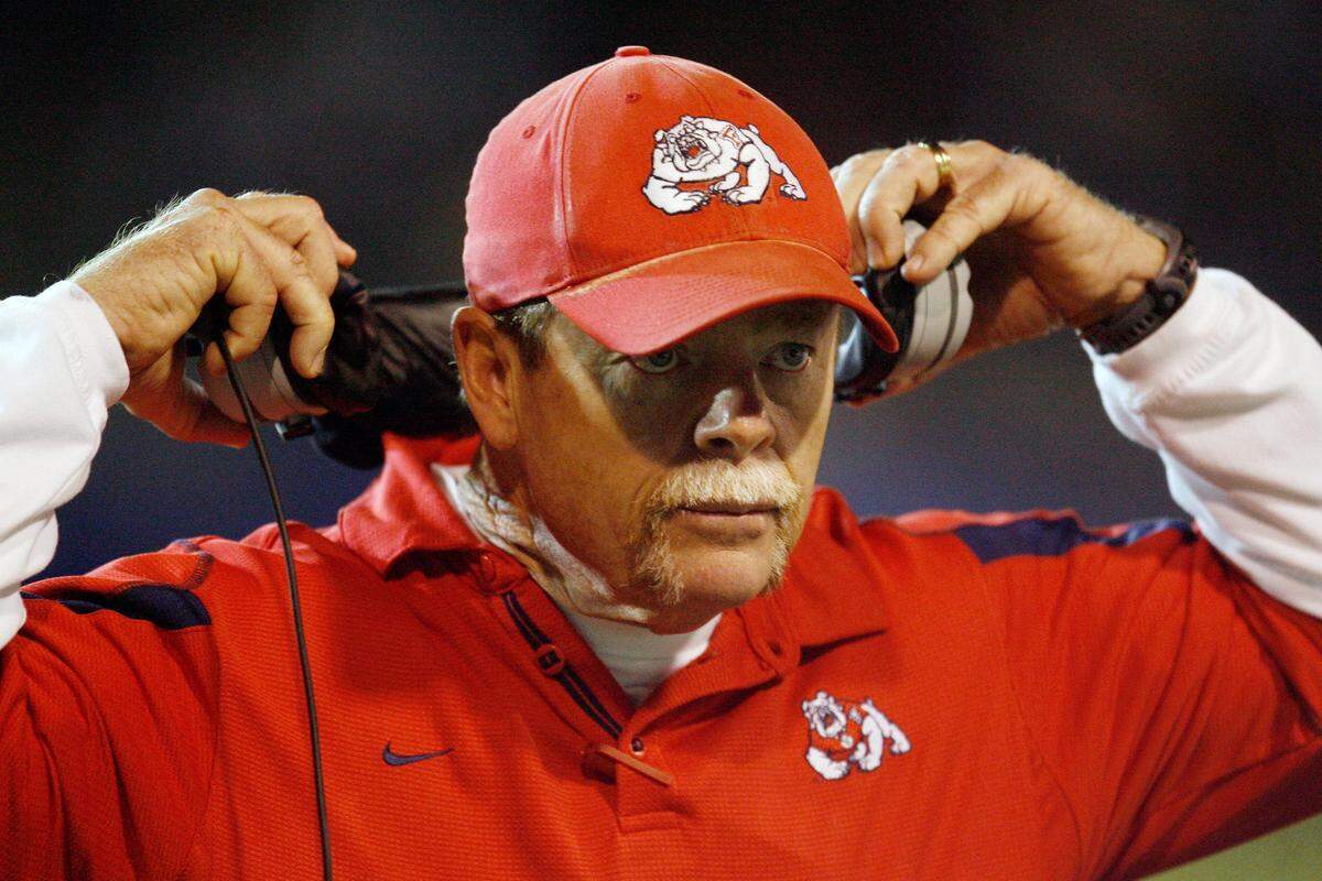 Pat Hill served as head coach of the Fresno State football team from 1997-2011, amassing a 112-80 overall record and guiding the Bulldogs to 11 bowls. One of his best seasons came in 2005 when Fresno State was ranked as high as No. 16 in the nation and took on No. 1 USC.