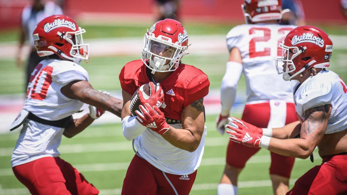 Fresno State receiver Zane Pope runs upfield on a pass play during the Bulldogs’ spring preview event Saturday, April 30, 2022, at Bulldog Stadium.