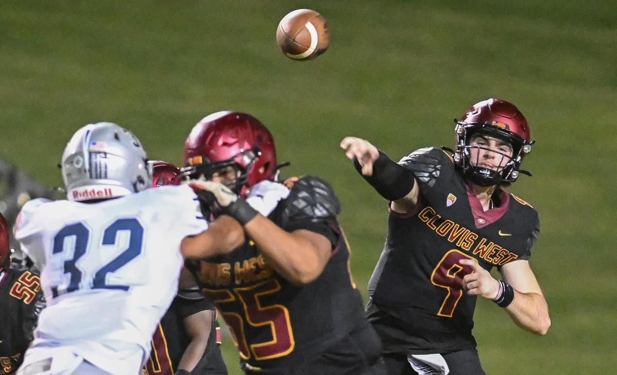 Clovis West quarterback Tyler Patrick throws against the Clovis East defense during their game at Veterans Memorial Stadium in Clovis on Friday, Oct. 6, 2023.