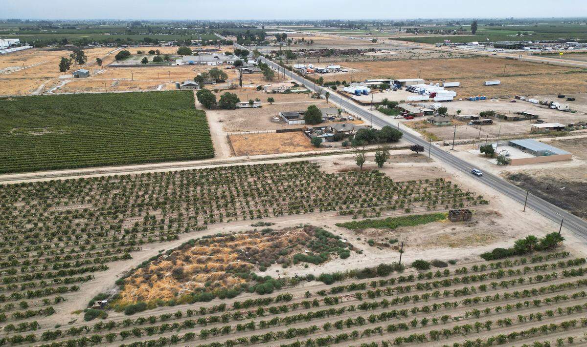 An area looking southwards along Cherry Avenue south of E North Ave. towards E. Central Ave., background, shown Thursday, Sept. 18, 2025 south of Fresno. The Fresno City Council will decide to annex and rezone this area but people who live in those rural areas and administrators at the Orange Center School District, located at top left, oppose the change.