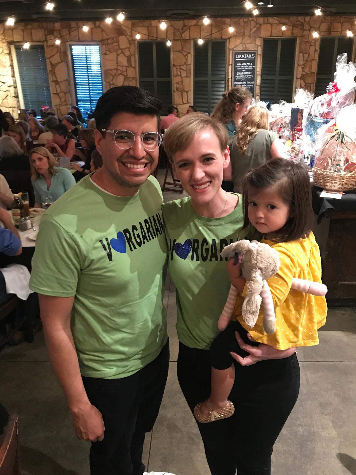 Allison Vargas, center, with her husband Jose and daughter Everly during a March fundraiser dinner at Romano’s Macaroni Grill in Fresno organized by Helping One Woman, Fresno Chapter to raise money for Vargas as she fights colon cancer.