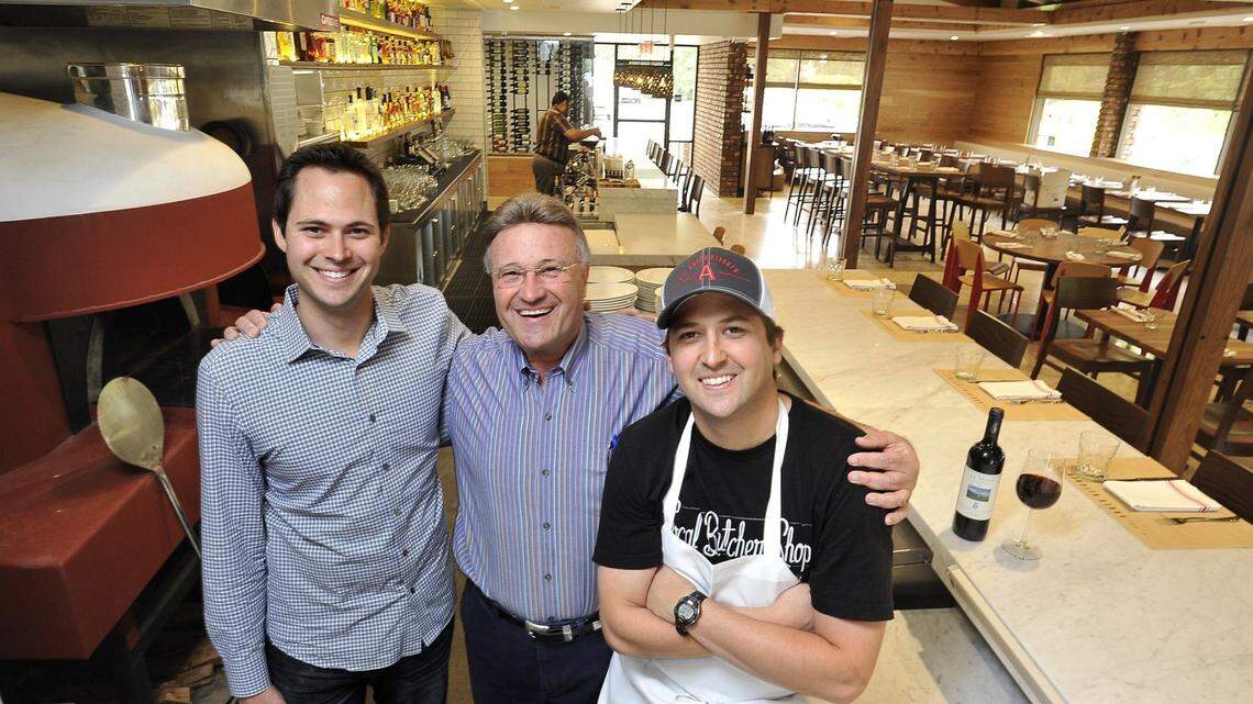 Jimmy Pardini, right, with father Jim Pardini, center, and brother Jeff, are opening a pizza restaurant called Annesso Pizzeria. The family is pictured at The Annex Kitchen in this file photo from 2015.