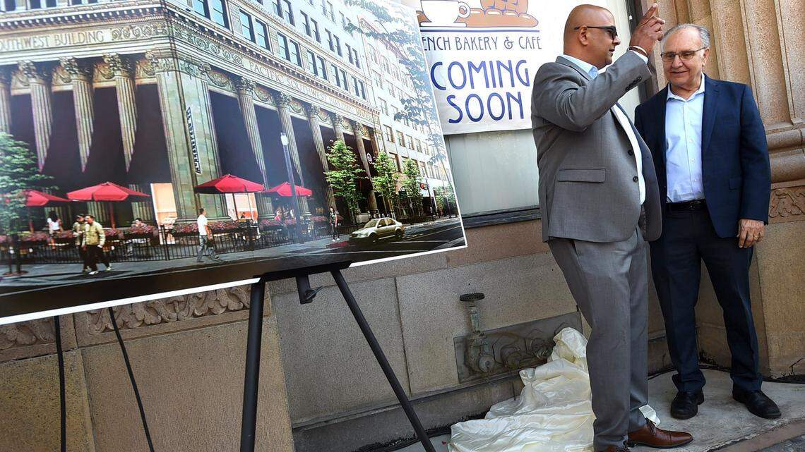 La Boulangerie is gearing up to open its second location, a walk-up window in downtown Fresno. Mayor Lee Brand, far right, talks with a La Boulangerie co-owner in this Fresno Bee file photo after a 2018 event announcing the location.