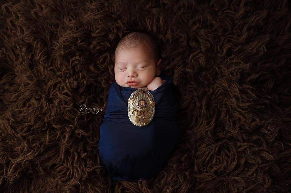 Nearly two months after Selma Police officer Gonzalo Carrasco Jr. died in the line of duty, his son&nbsp;took newborn photos while swaddled in a navy blue blanket and with officer’s badge.
