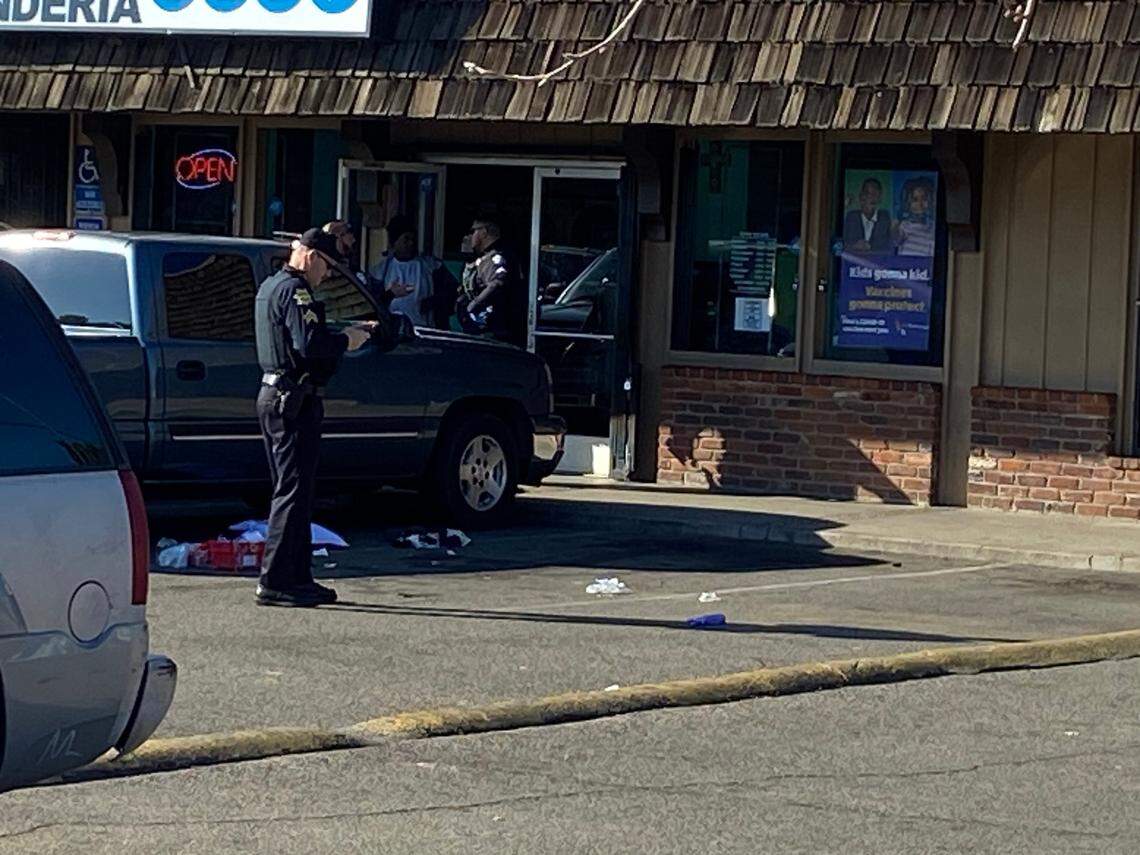 Fresno police investigate following a shooting near California and Pottle avenues on Friday, Dec. 9, 2022.