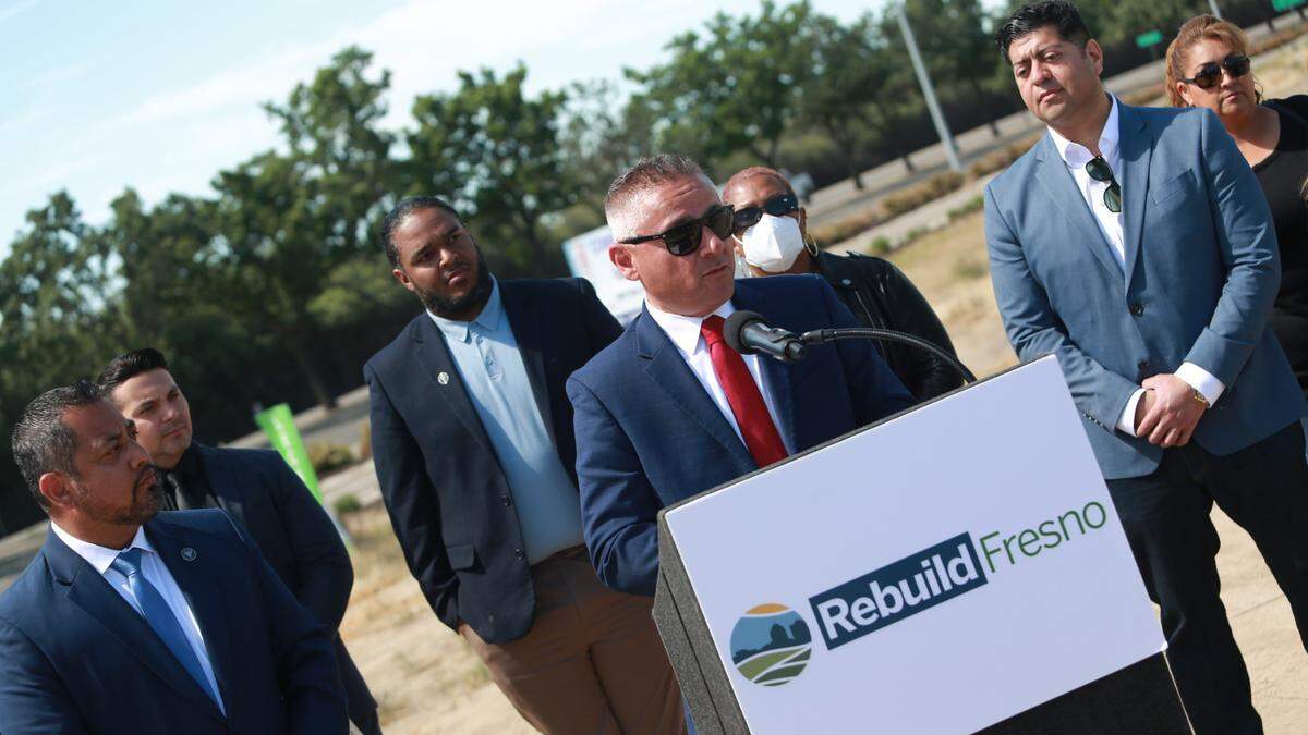 Justin Preas, deputy CEO with the United Health Centers of the San Joaquín Valley during a press conference on the empty lot that will become the future home of the clinic in southeast Fresno. Fresno City Councilmembers Miguel Arias and Luis Chávez joined United Health Centers officials Thursday morning to announce their collaboration to expand access to medical, dental and optometry services with the construction of the facilities in areas that face health inequities, lack of access to healthcare services and other many barriers, such as transportation.