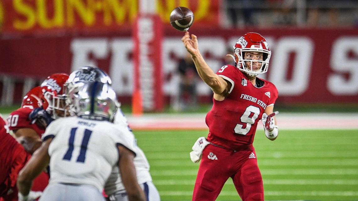 Fresno State quarterback Jake Haener throws against Nevada during their game at Bulldog Stadium on Saturday, Oct. 23, 2021.