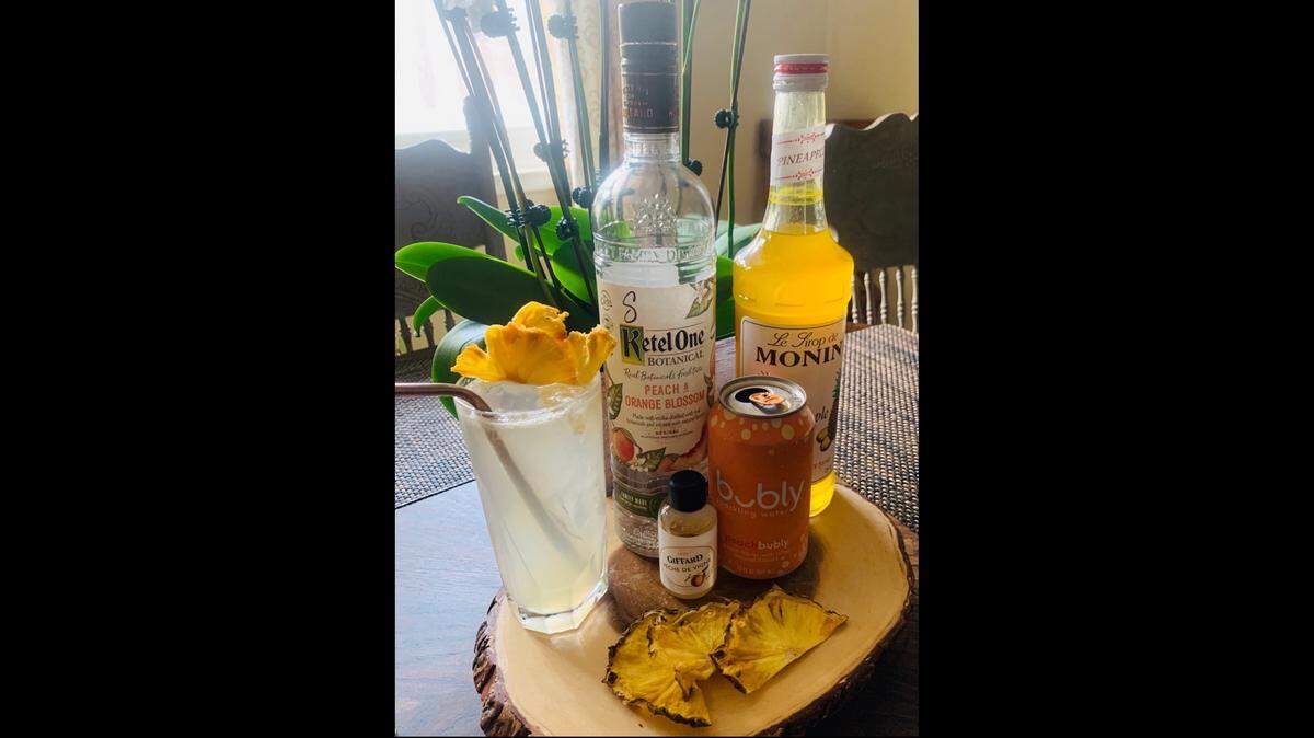 The Peach Quarantini cocktail was created by Sarah Primavera at Lucy’s Lounge.