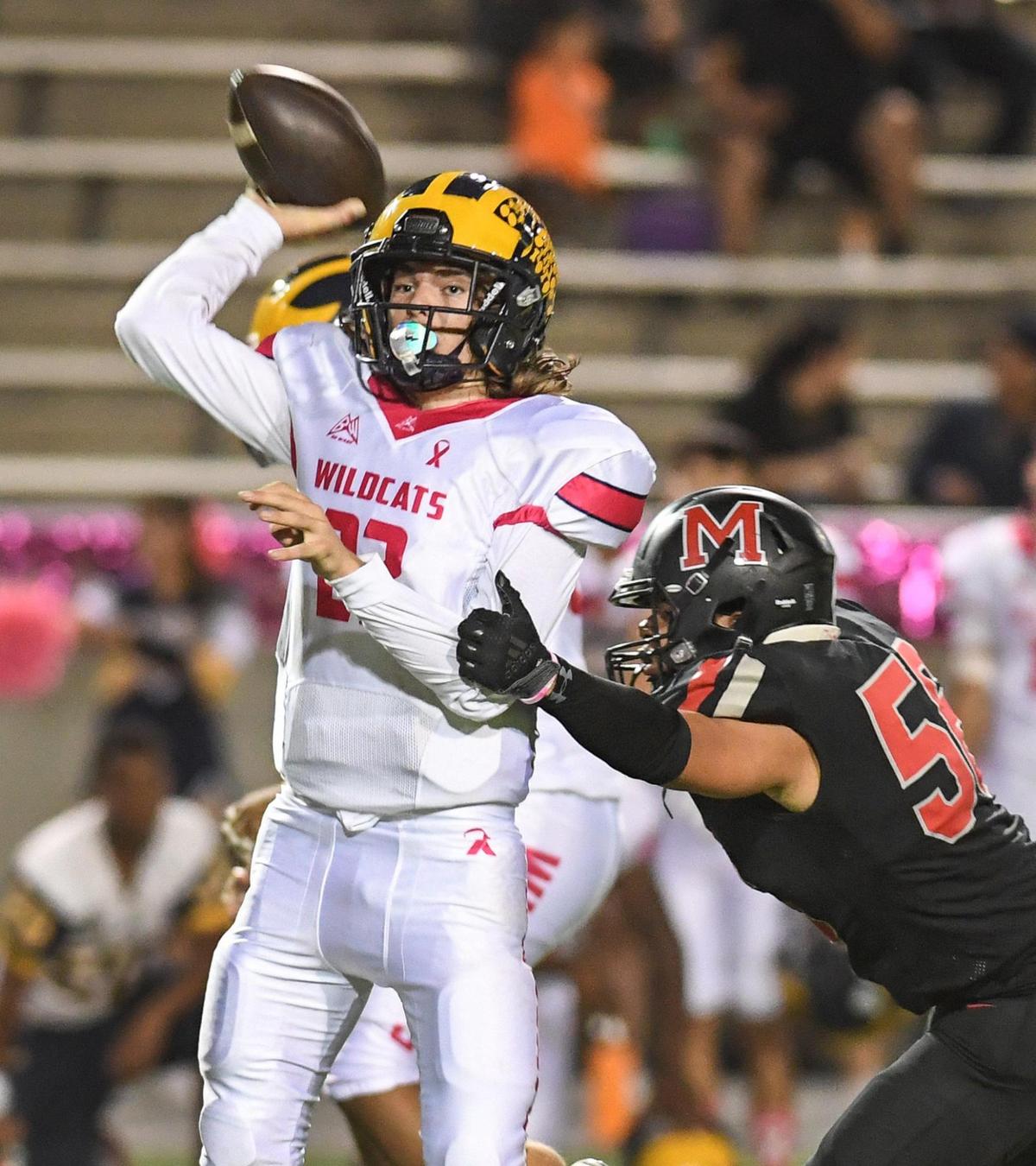 Sunnyside quarterback Tanner Wilson gets a pass off before being potentially sacked by McLane’s Johnathan Vargas during their football game at McLane Stadium on Friday, Oct. 21, 2022.