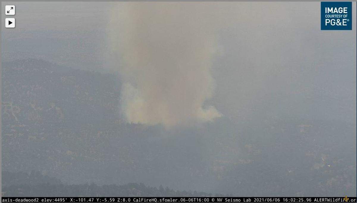 PG&E Skycam captures fire burning near Road 600 and 612 in Madera County. PG&E