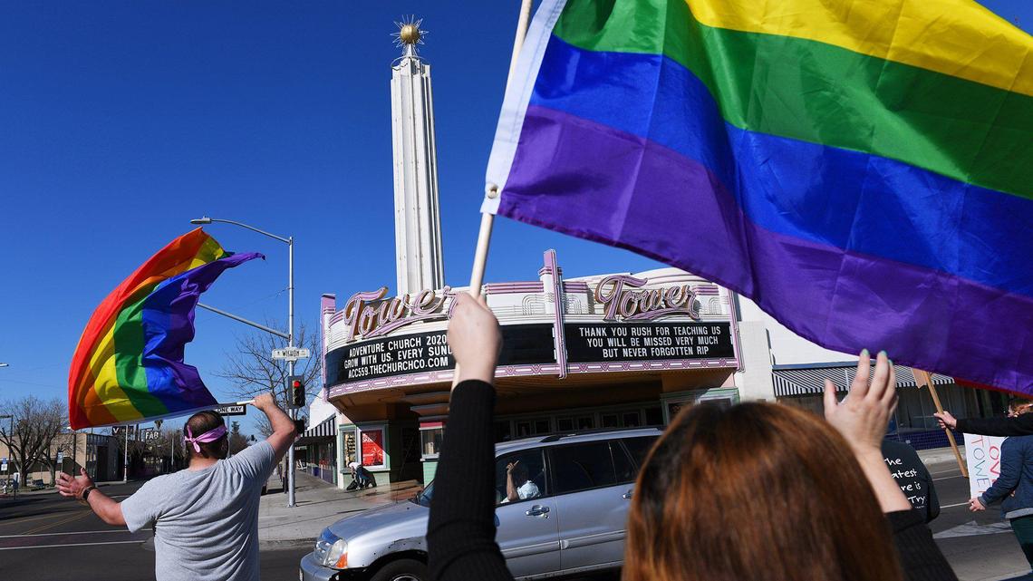 Approximately 100 people gathered one Sunday in February 2021 across from the Tower Theatre in Fresno, California, to protest rezoning and the purchase by Adventure Church.