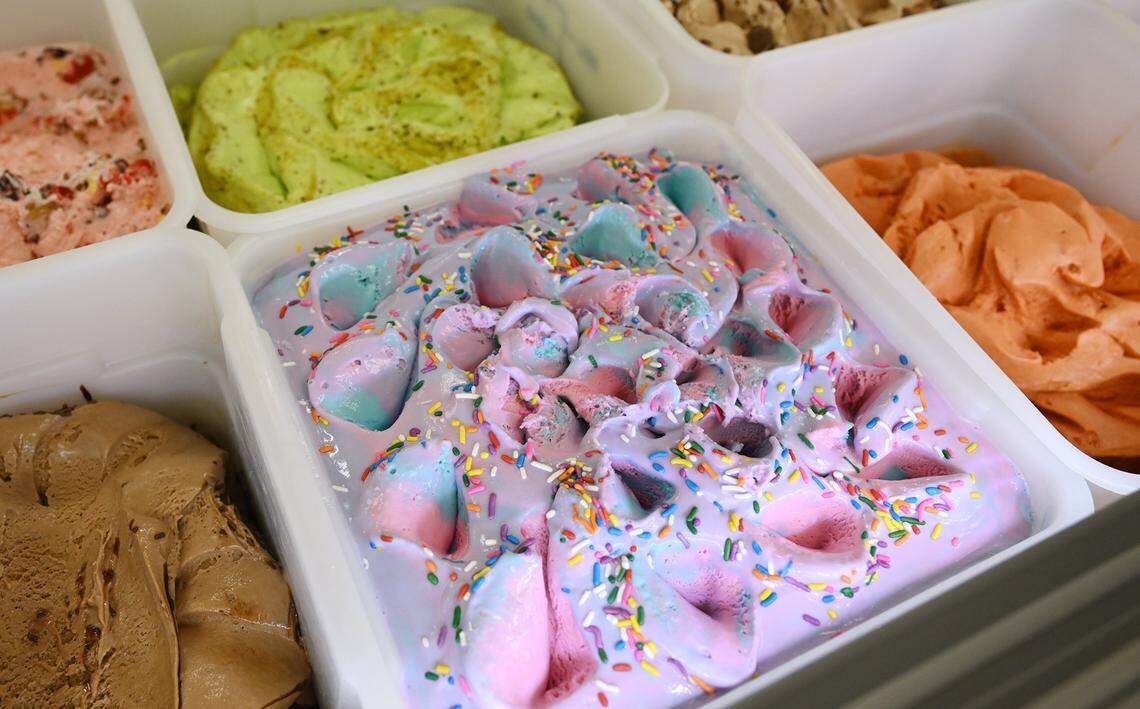 A huge colorful variety of paletas including Chicle/Bubblegum, center, is offered at Paleteria Y Neveria El Arco De Michoacan, photographed Friday, Oct. 23, 2025 in Fresno.