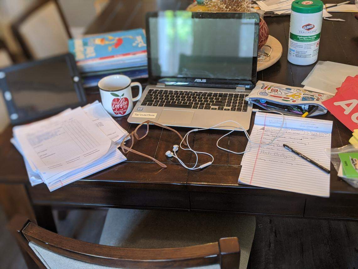 Kelly Castillo’s work station at her Fresno home. Castillo, a special education teacher at Susan B. Anthony Elementary School, had to work from home while schools were closed to help slow the spread of coronavirus.