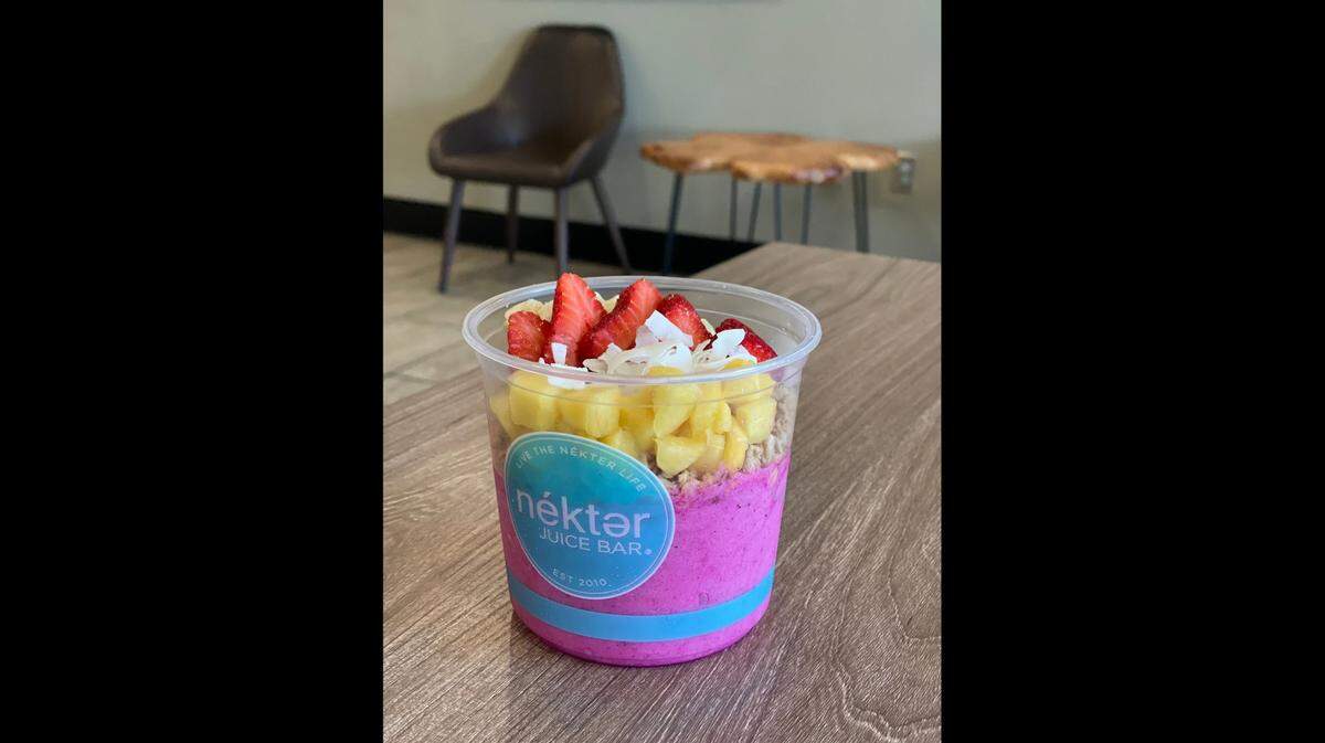 Acai bowls made from blended berries and topped with fruit are on the menu at Nekter Juice Bar.