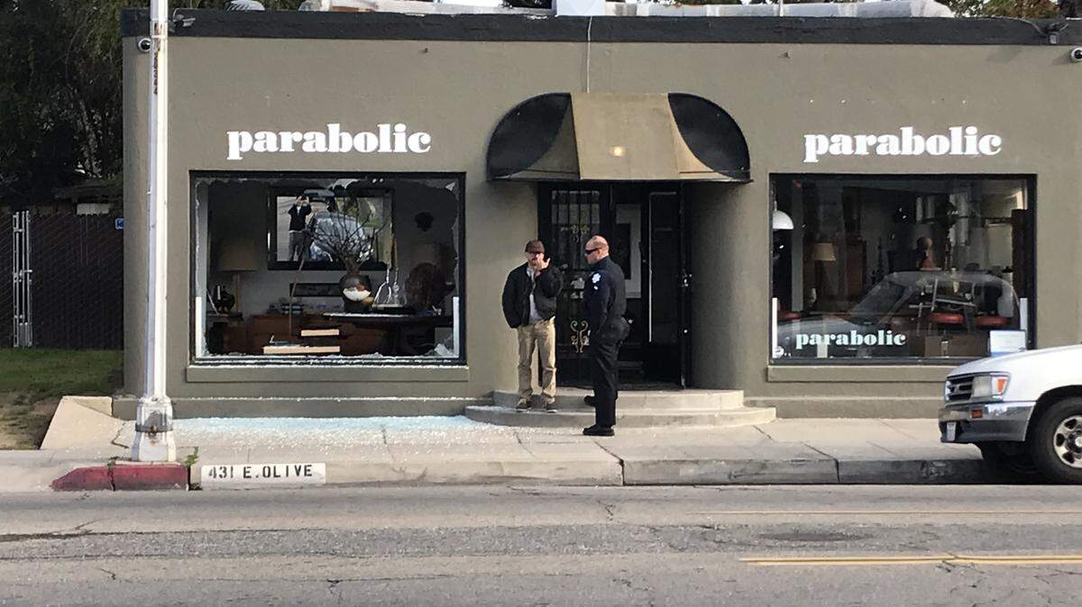 Police investigate vandalism at Parabolic, a Tower District furniture store, where a large plate glass window was broken. The business has been repeatedly targeted since 2018.