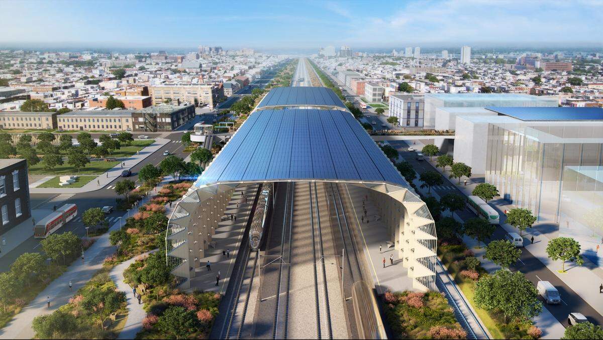 Una versión simplificada de una estación del tren de alta velocidad con andenes cubiertos a ambos lados de la línea ferroviaria.