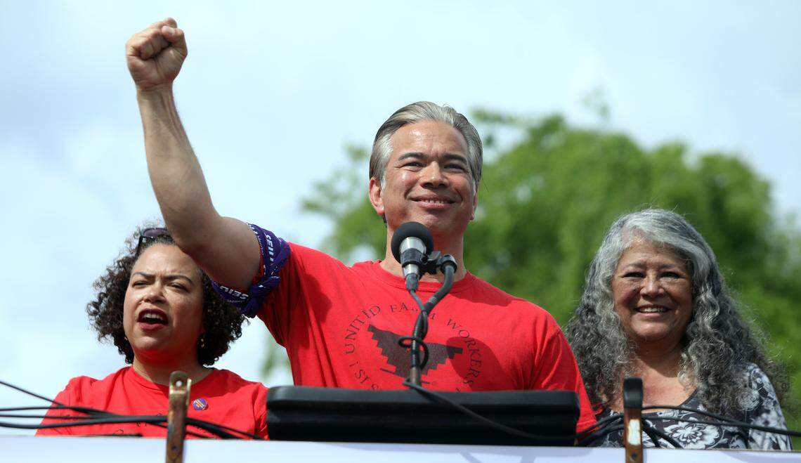State Attorney General Rob Bonta told United Farm Workers members and supporters that his office will protect farm workers. He spoke at Delano Memorial Park before an estimated 7,000 marched three miles to Forty Acres on what would have been UFW founder César E. Chávez’s 98th birthday on March 31, 2025. He was joined by his wife, Assemblymember Mia Bonta, and UFW President Teresa Romero.