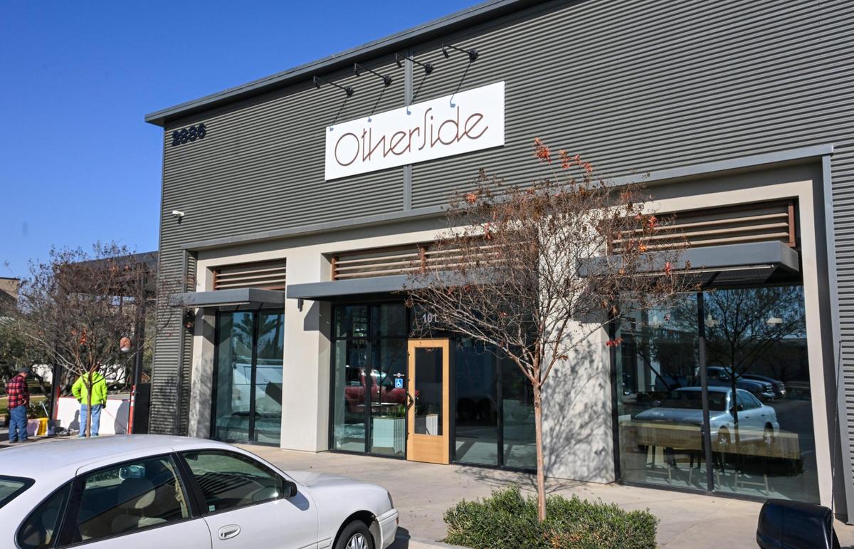 Work progresses at Otherside, a coffee shop that will be opening soon at Willow and Shepherd avenues in The Row at Heritage Grove.