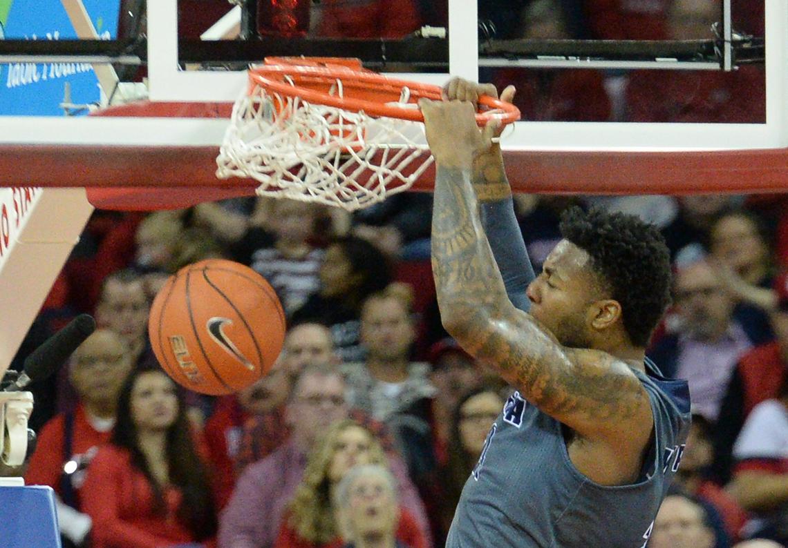 Nevada forward Jordan Caroline dunks during the Wolf Pack’s 74-64 victory over the Fresno State Bulldogs at the Save Mart Center on Saturday, Jan. 12, 2019. Carolina had 19 points and 16 rebounds, with seven offensive rebounds.