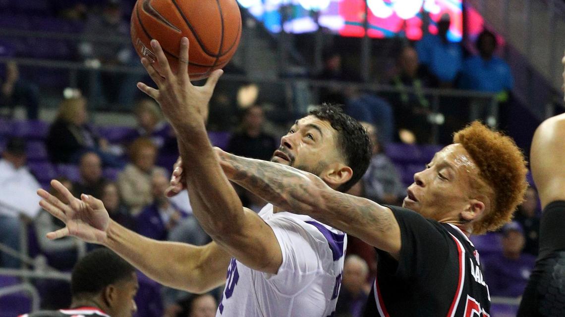 TCU guard Alex Robinson (25) is fouled by Fresno State guard Noah Blackwell (55) during the first half of the Bulldogs’ 77-69 loss to the Horned Frogs Thursday, Nov. 15, 2018, in Fort Worth, Texas. The Bulldogs led by two at halftime, but TCU hit 20 of 30 shots in the second half to pull away.